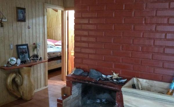 Chimenea + entrada a dormitorios y baños, casa segundo nivel